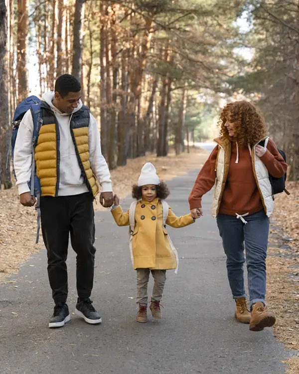 Ankle & Foot Centers of America Family Walking on the road Ankle & Foot Centers of America Family Walking on the road